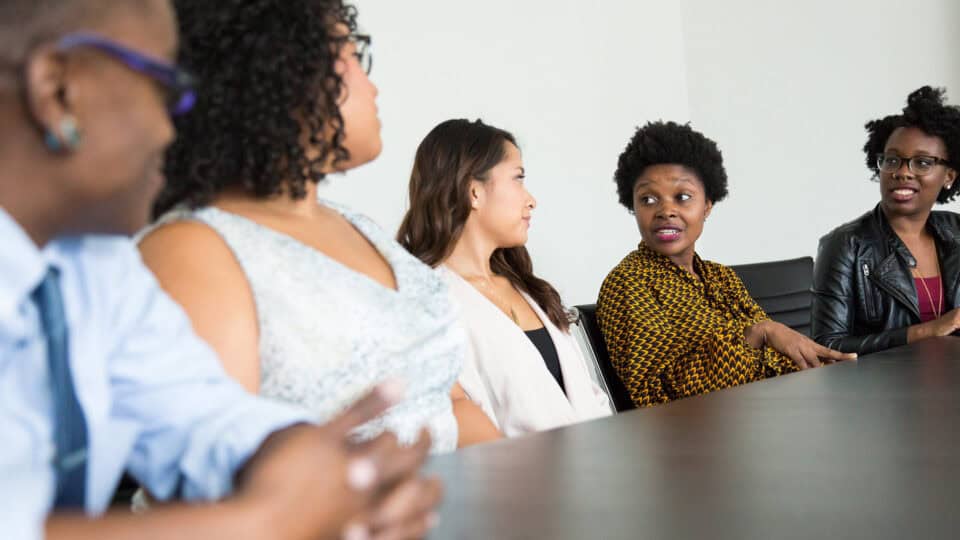 Diverse group of professionals collaborating in a workplace