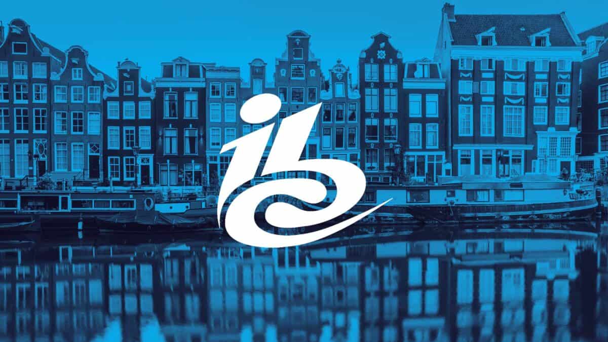 IBC Amsterdam event logo over a blue city illustration