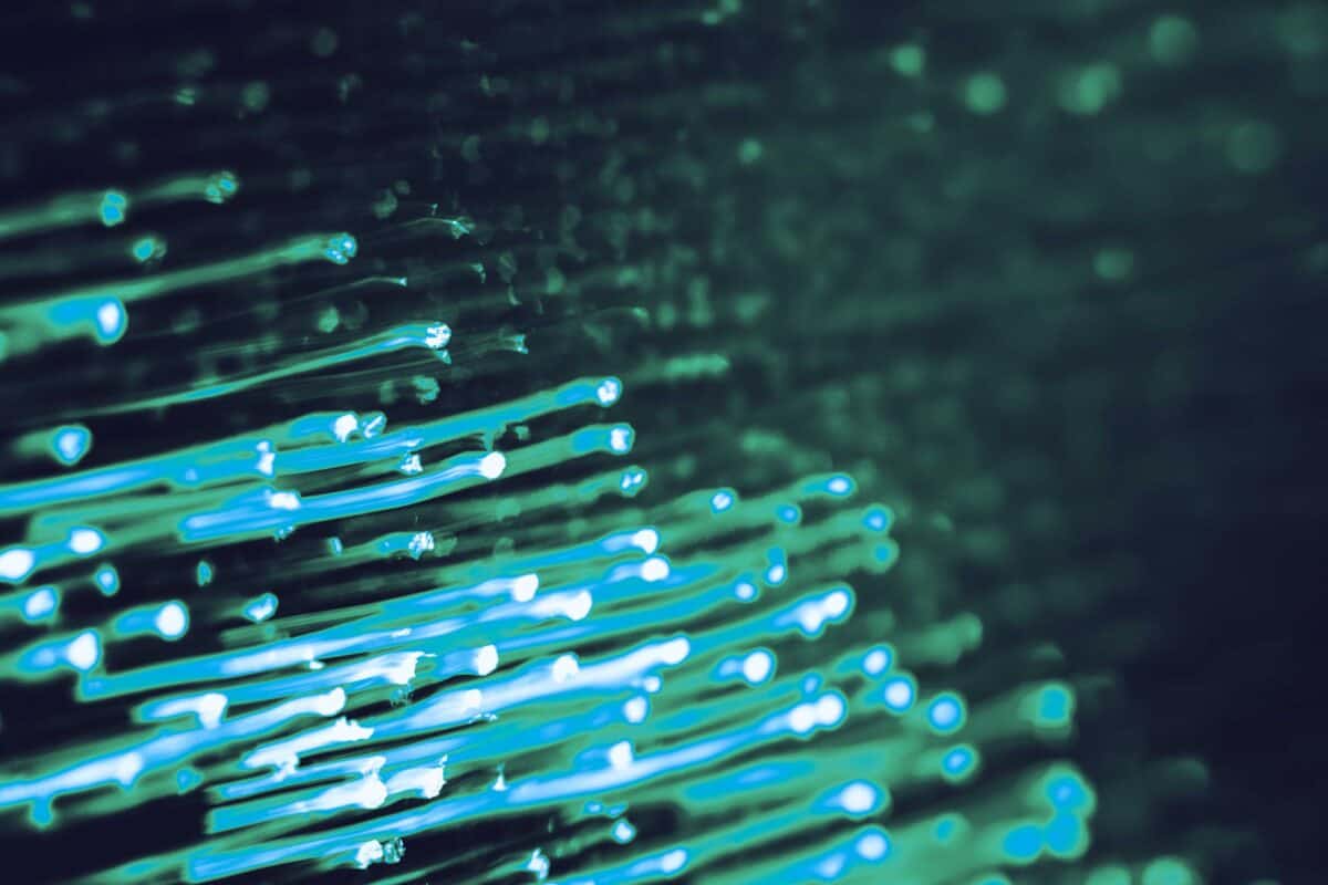 Rows of glowing lights representing satellite communications data transmission
