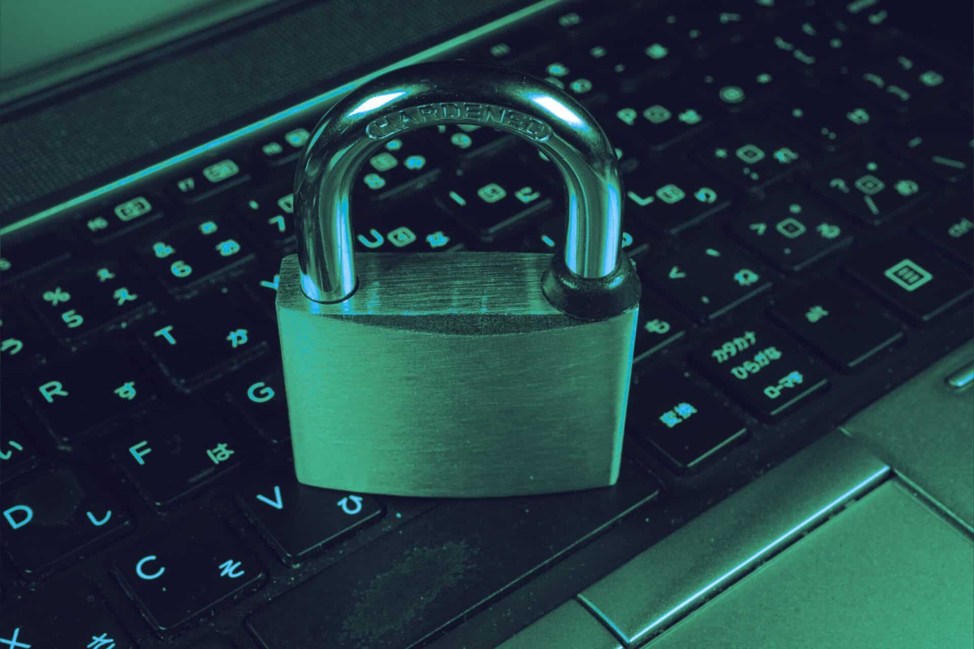 Illuminated padlock protecting data in a dark cyber security graphic