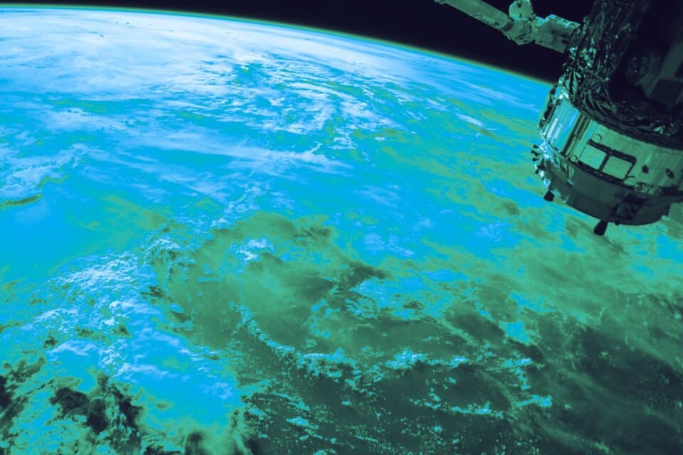 Curved horizon of Earth viewed from space in blue light