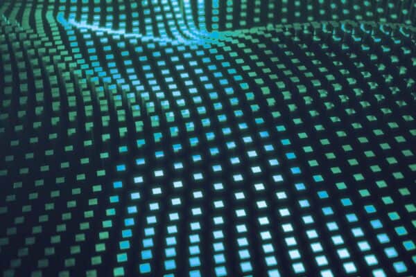 Rows of illuminated data points forming a digital media background