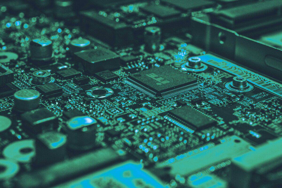 Electronic hardware components across a dark cyber security circuit board