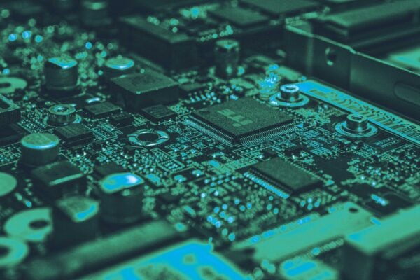 Electronic hardware components across a dark cyber security circuit board