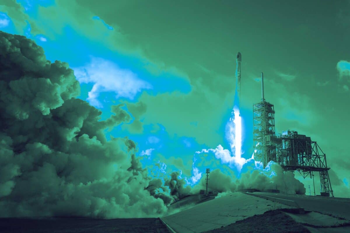 Rocket launching through clouds into the upper atmosphere