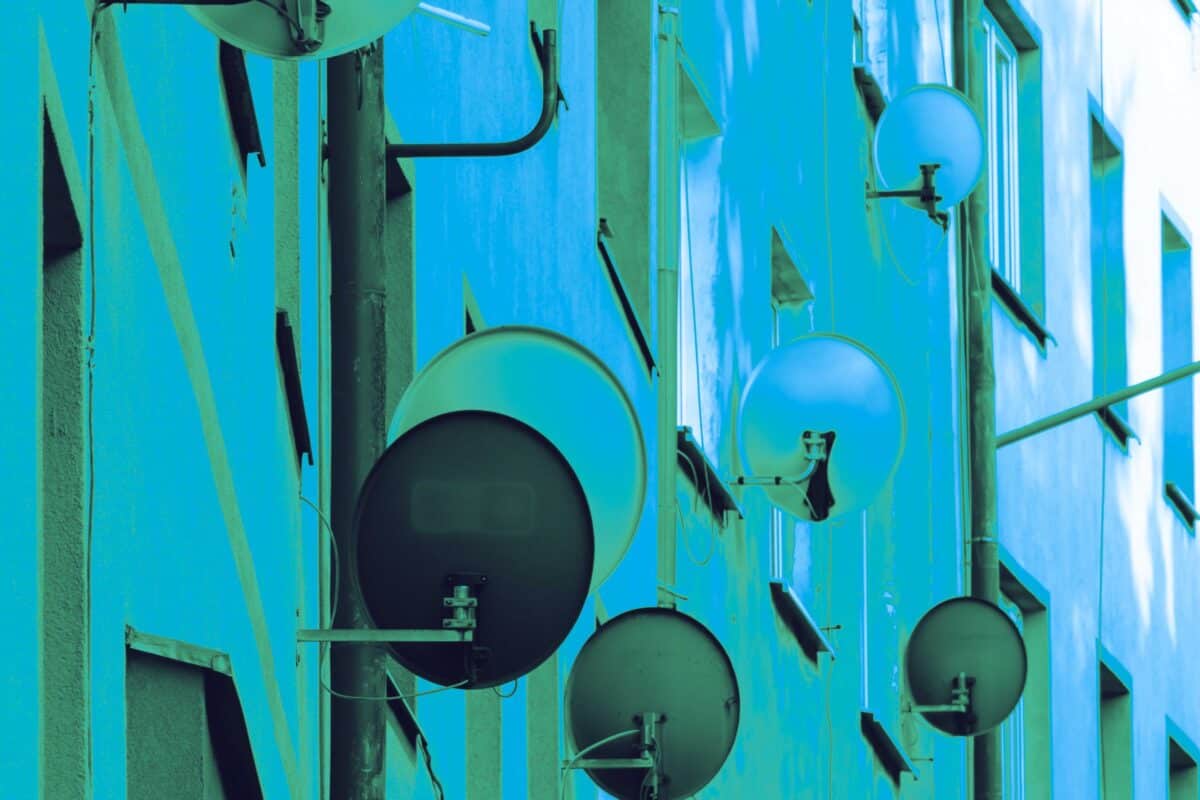 Smart home devices arranged against a blue technology background
