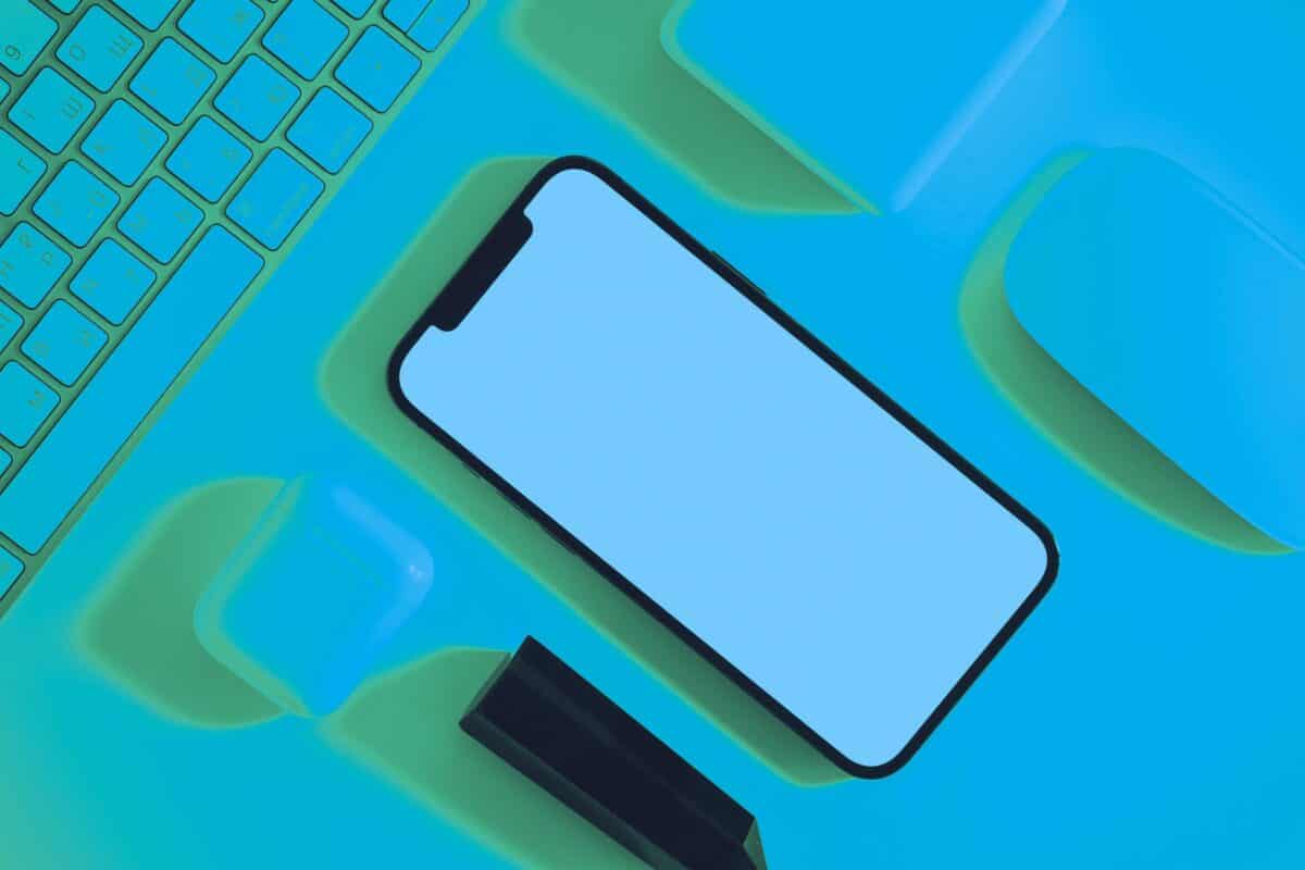 Smartphone with a blank screen on an abstract blue background