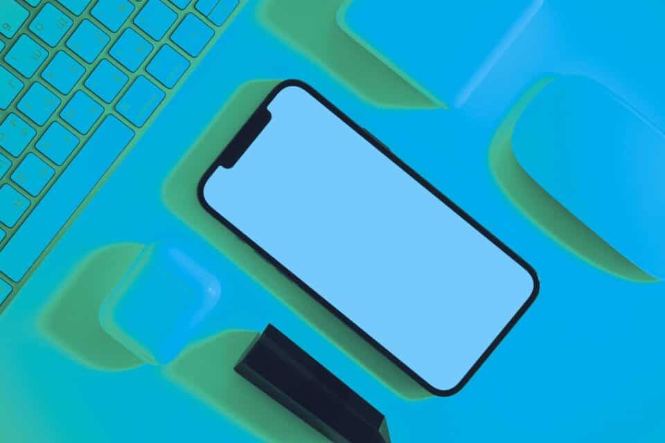 Smartphone with a blank screen on an abstract blue background