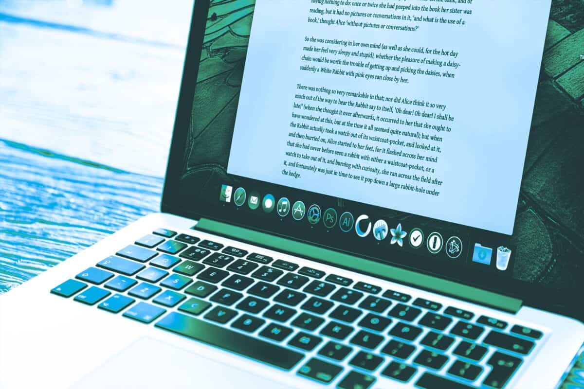 Laptop displaying technical data during cyber security monitoring