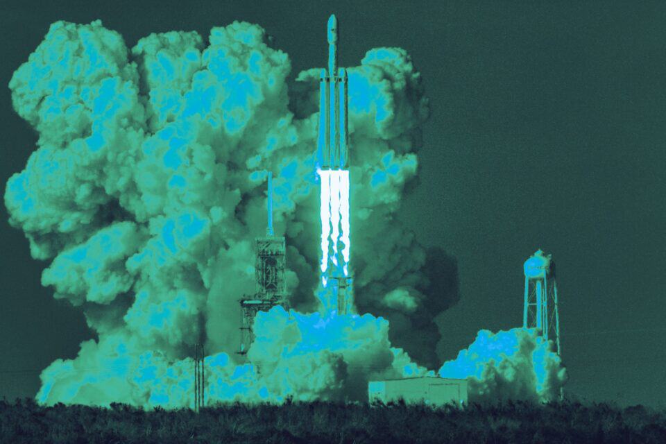 Rocket launching through clouds into the upper atmosphere