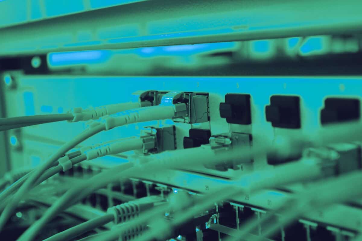Network cables connected to a router for digital communications