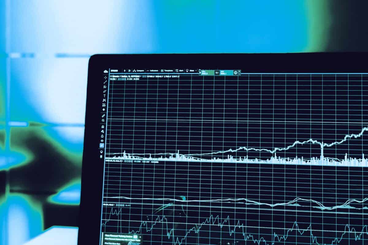 Computer monitor displaying network activity and cyber security data