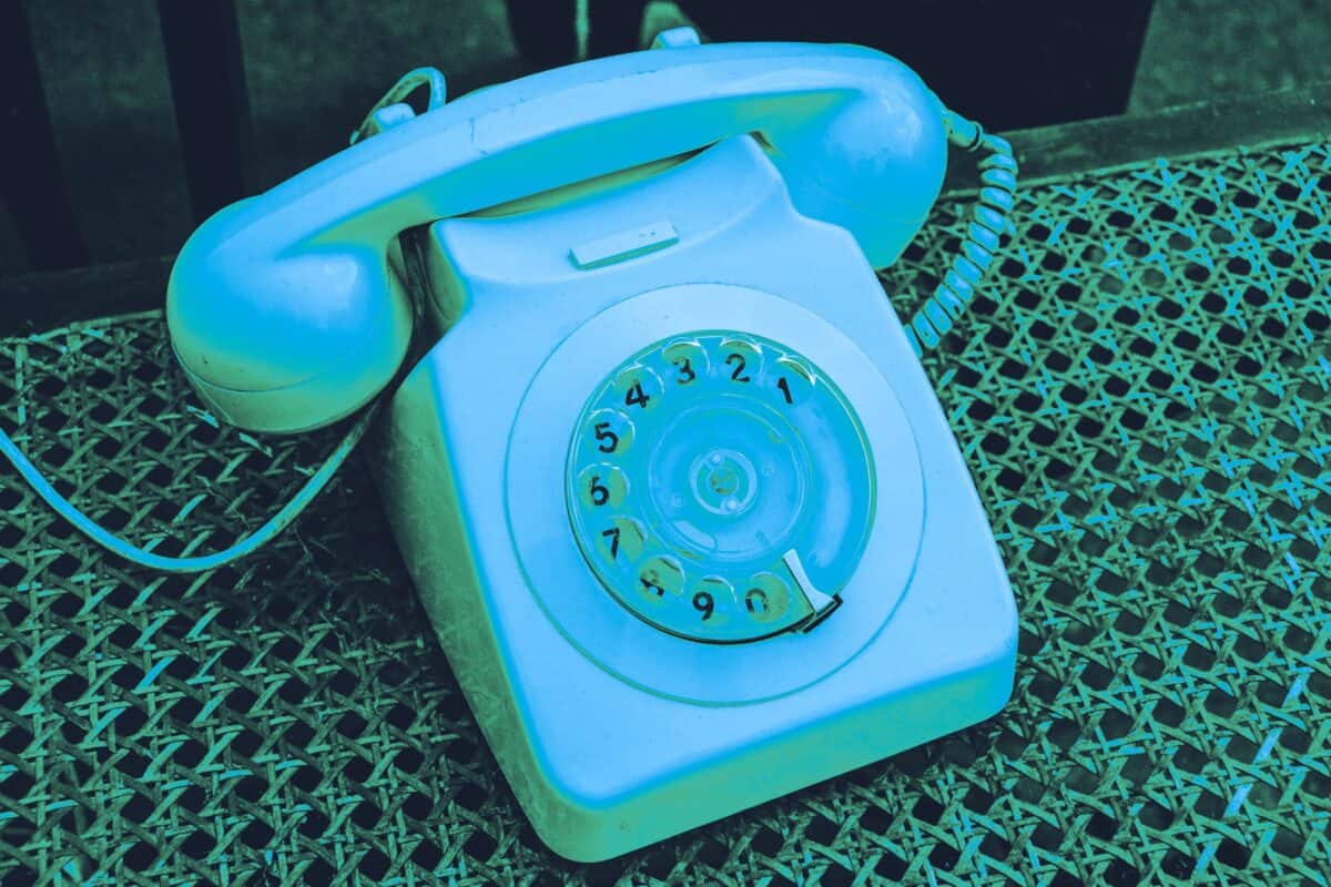 Vintage rotary telephone representing the evolution of communications technology