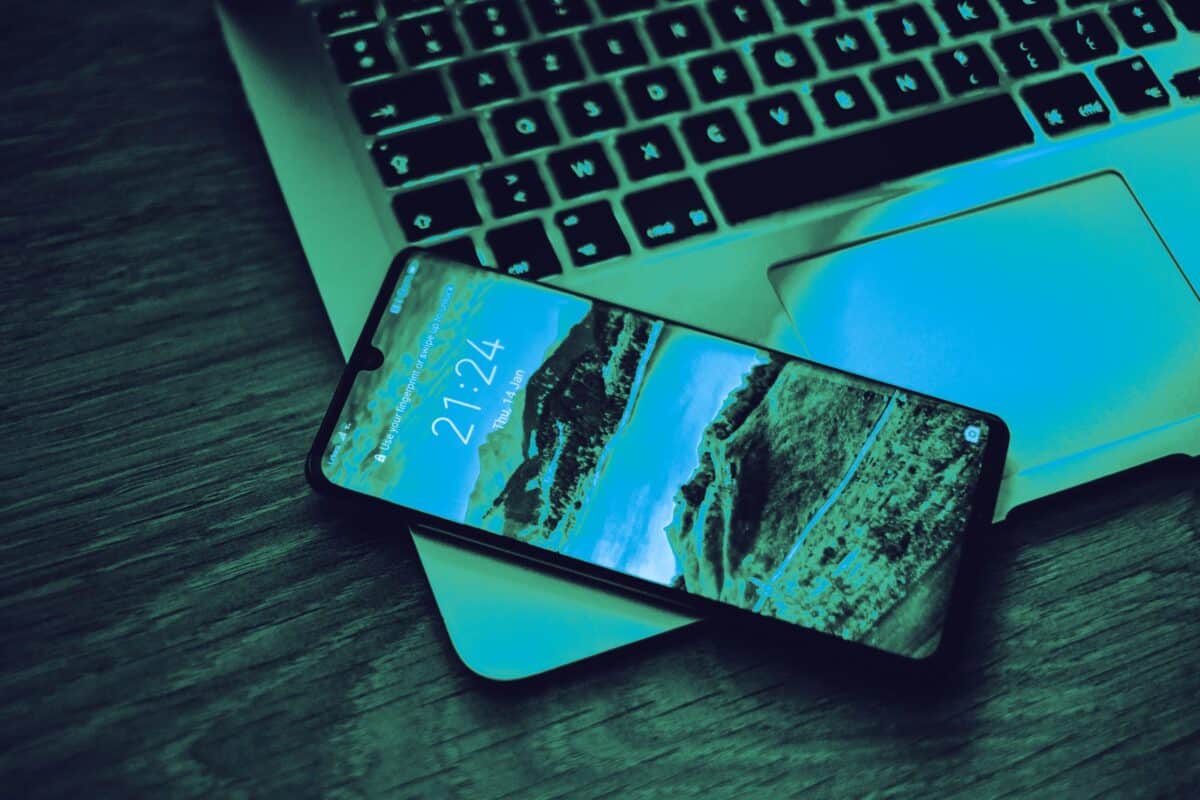 Smartphone and laptop used together for connected digital communications