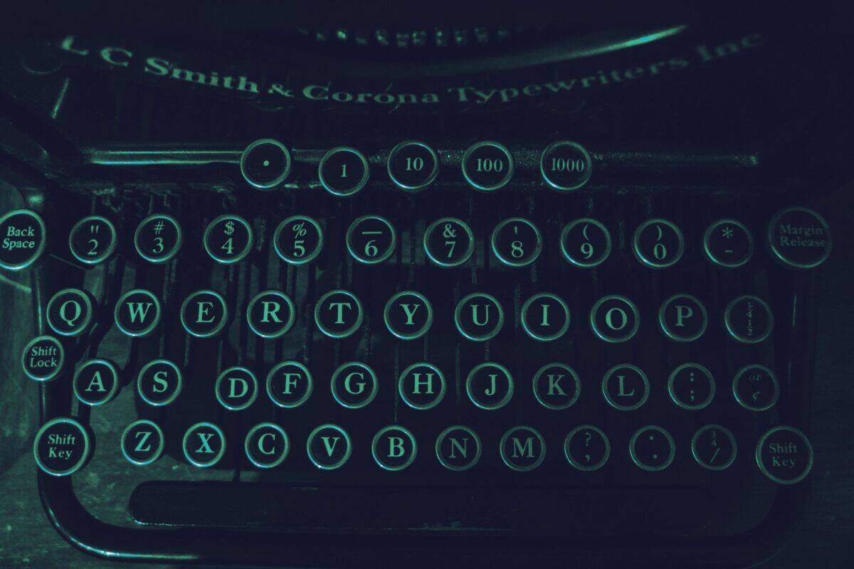 Password symbols displayed above a computer keyboard in a security graphic