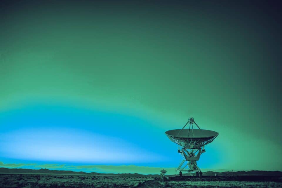 Satellite communications technology positioned above the curved Earth