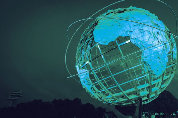 Digital globe surrounded by connected cyber security network lines
