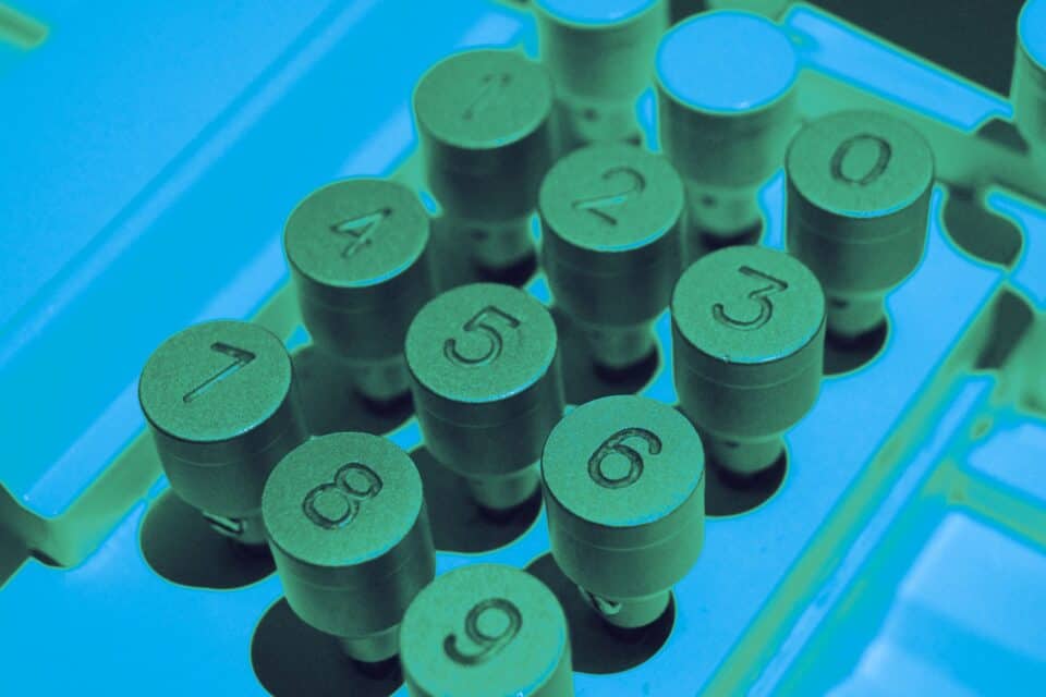 Rows of cylindrical components in a green cyber security technology scene
