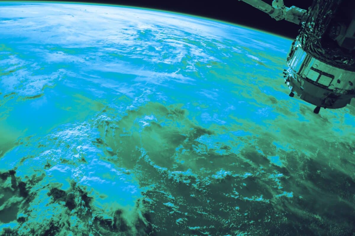Curved horizon of Earth viewed from space in blue light