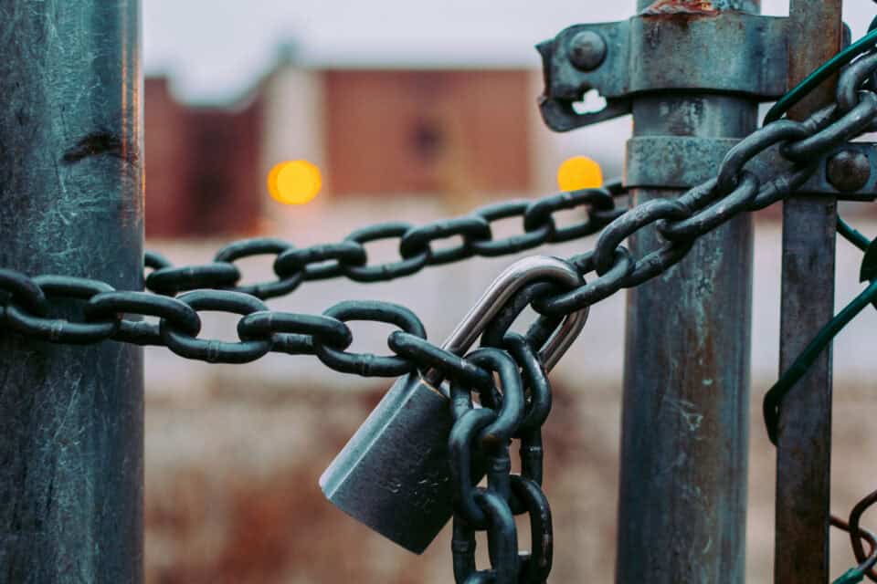 Heavy chain links representing strength and cyber security protection