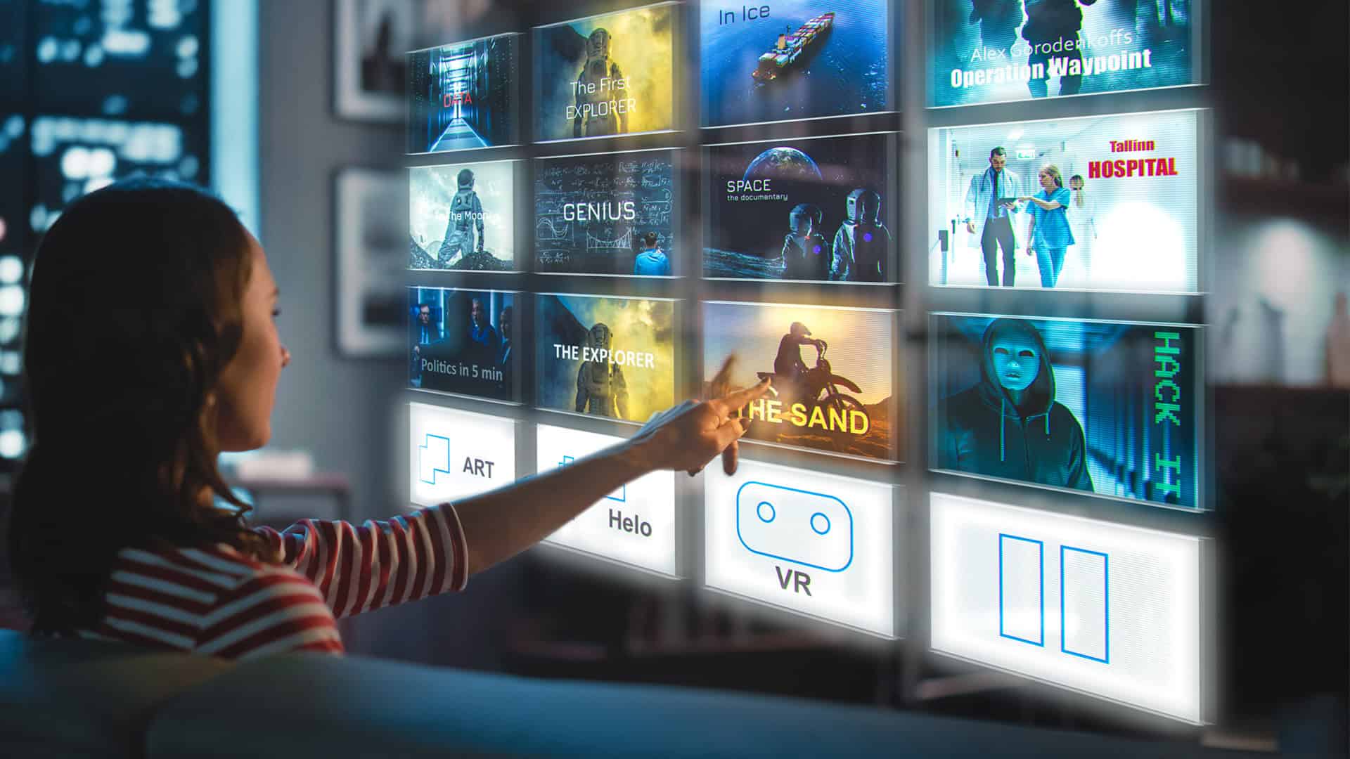 Hand selecting content on an interactive digital media wall