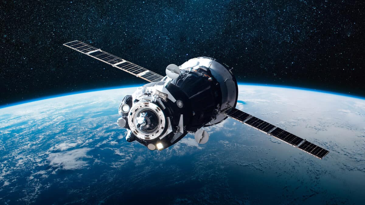 Satellite communications spacecraft orbiting above Earth