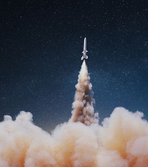 Launch vehicle rising into the sky for a satellite mission